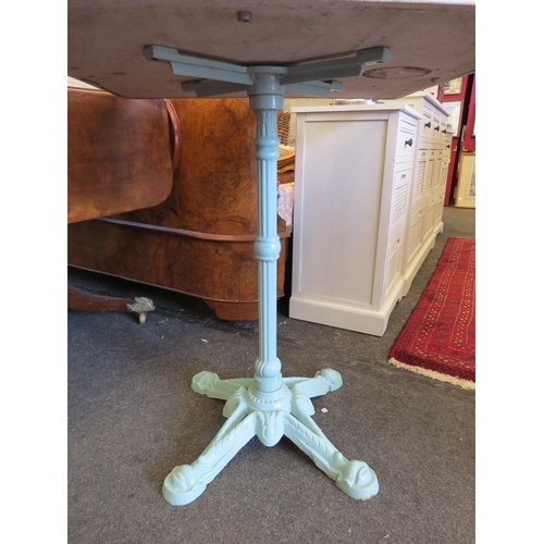 1248 - A blue painted cast iron base table with square quartz top, 73cm tall x 70.5cm squared top