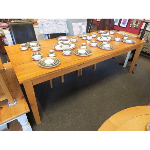 1256 - A large hardwood refectory table, 77cm tall x 240cm long x 105cm wide