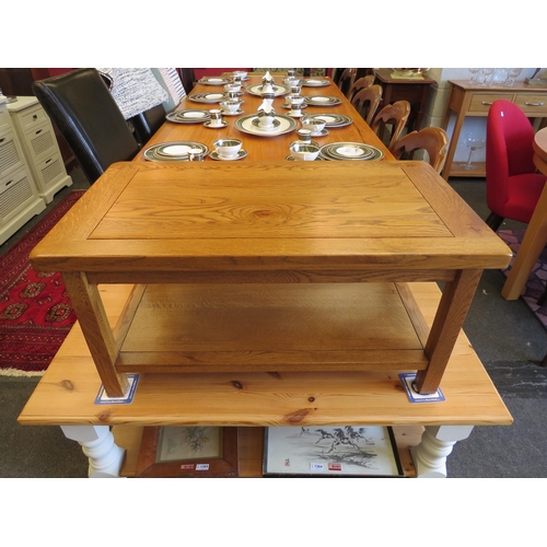 1261 - An oak two tier occasional table, 45cm tall x 90cm long x 50cm wide