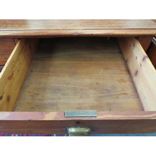 1269 - A Victorian pine two drawer school desk/table on turned legs and brass castors, 78cm tall x 122cm wi... 