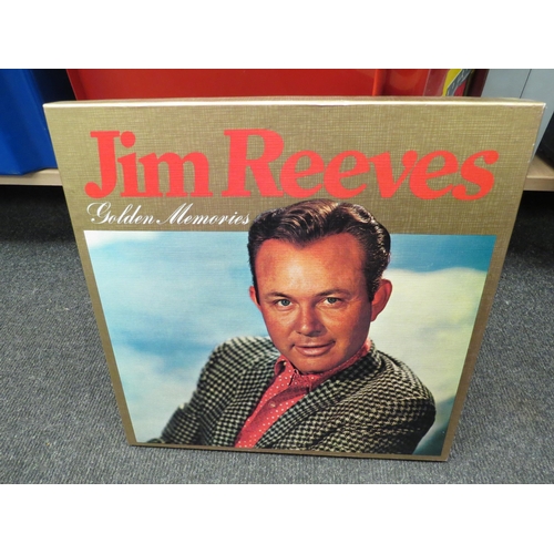 1302 - Two boxes containing a collection of vinyl LP records and box sets including James Last, Glen Miller... 