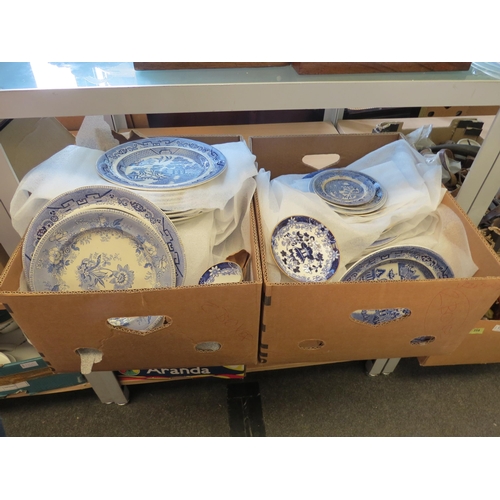 1311 - Two boxes containing a collection of 19th century and later blue and white transfer ware including m... 