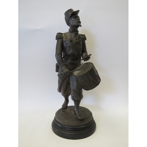 1323 - A spelter figure of a US Civil War era drummer (bandsman), 37.5cm high