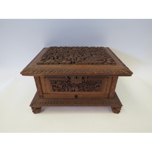 1328 - A Victorian carved Oriental jewellery box, velvet lined interior, one foot missing