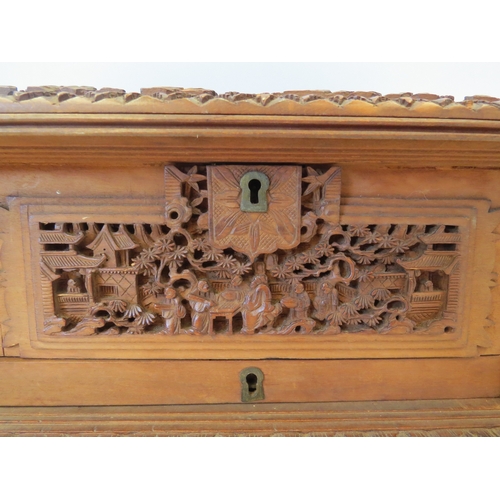 1328 - A Victorian carved Oriental jewellery box, velvet lined interior, one foot missing