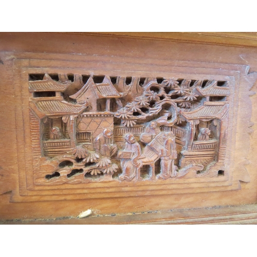 1328 - A Victorian carved Oriental jewellery box, velvet lined interior, one foot missing