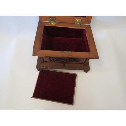 1328 - A Victorian carved Oriental jewellery box, velvet lined interior, one foot missing