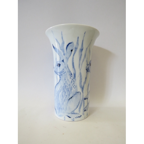 1336 - A Grahame Clarke porcelain hare design vase with fluted rim, 23.5cm tall