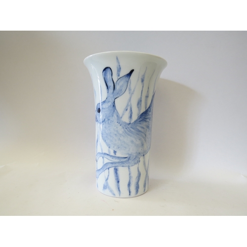 1336 - A Grahame Clarke porcelain hare design vase with fluted rim, 23.5cm tall