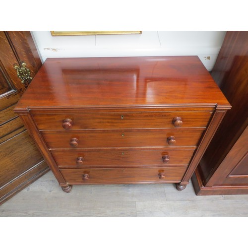 2111 - A 19th Century mahogany break front chest of four drawers, indent to one drawer, 101cm x 25.5cm