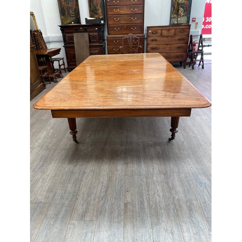 2151 - A 19th Century mahogany dining table, pull out mechanism with two extra leaves, 73cm x 258cm x 135cm