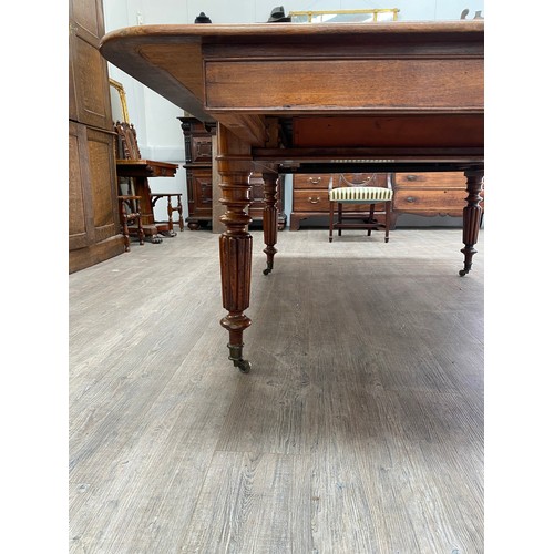 2151 - A 19th Century mahogany dining table, pull out mechanism with two extra leaves, 73cm x 258cm x 135cm