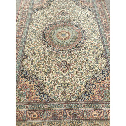 2163 - A green and orange peacock rug