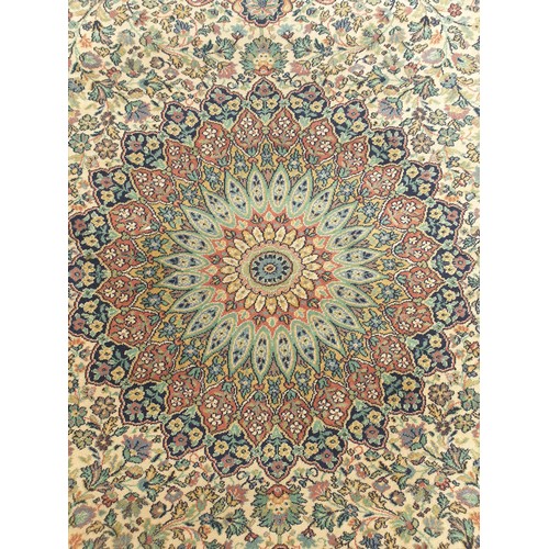 2163 - A green and orange peacock rug