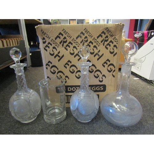 1569 - A pair of hobnail cut glass decanters, an Edwardian decanter, tankards, etc.