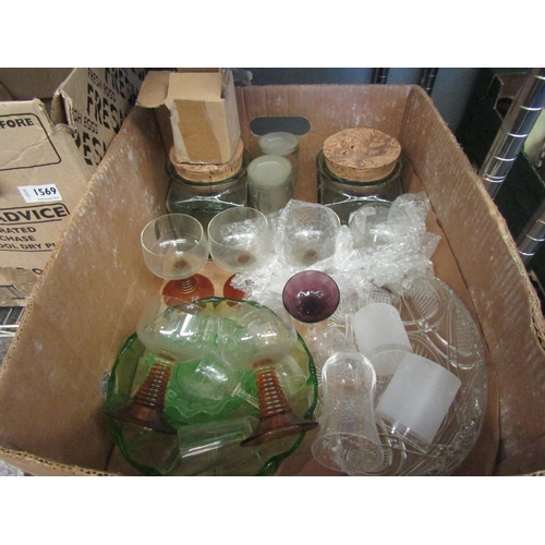 1570 - A box of miscellaneous glassware including two hand blown cannisters, wine glass, a pair of glasses ... 