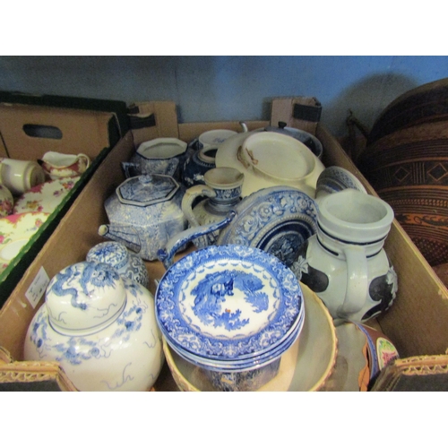 1584 - Two boxes of blue and white wares including ginger jars, dinner plates, teapots etc. some a/f