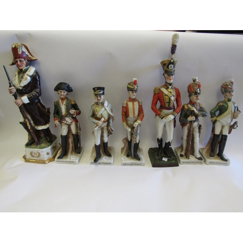 1590 - A hard paste porcelain figure 'Napoleon', a figure 'Officer 3rd Guards' and five Capodimonte figures... 