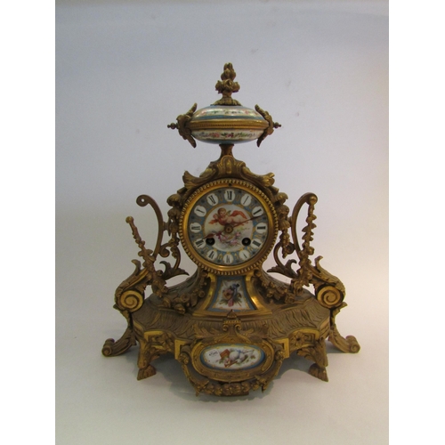 1593 - A late 19th/early 20th Century French porcelain and ormolu mantel clock, 33cm tall