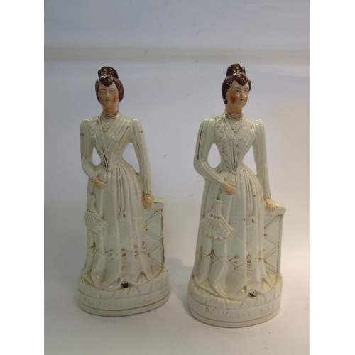 1606 - A pair of Staffordshire Princess May figurines, 40cm high