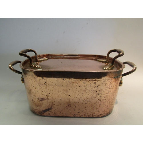 1623 - A Victorian Benham & Froud copper cooking pan and cover, 40cm long