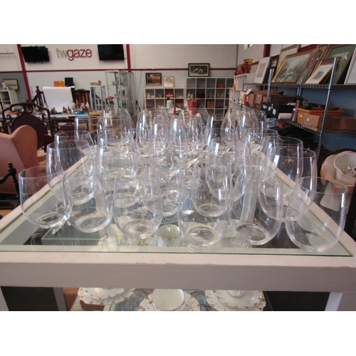 1653 - A suite of thirty clear glass drinking glasses to include brandy, wine and water