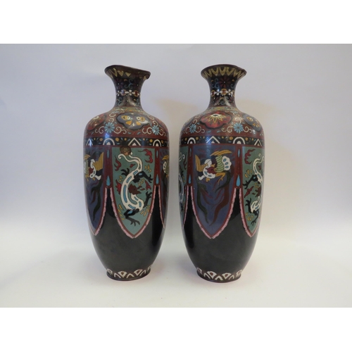 1101 - A pair of cloisonne vases of baluster form, rim to one heavily damaged, 37cm tall