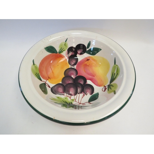 1340 - An Italian jug and bowl over-painted with fruit