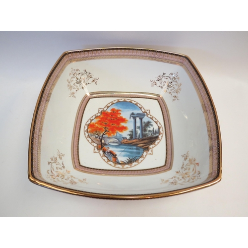 1350 - A porcelain bowl, gilt decoration of classical scene, boxed