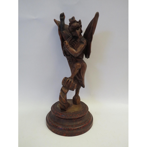 1357 - A 19th Century Oriental carved wooden figure of deity (restored), 40cm tall