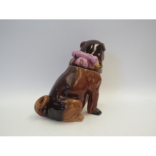 1359 - A Victorian majolica pug dog jar and cover, chip to rim, 20cm tall