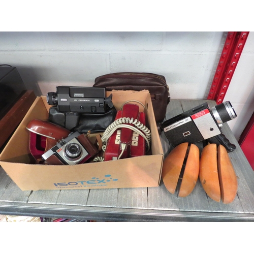 1390 - Two Eumig cine cameras and a Kodak camera, two shoe stretchers and Post Office leather bound telepho... 