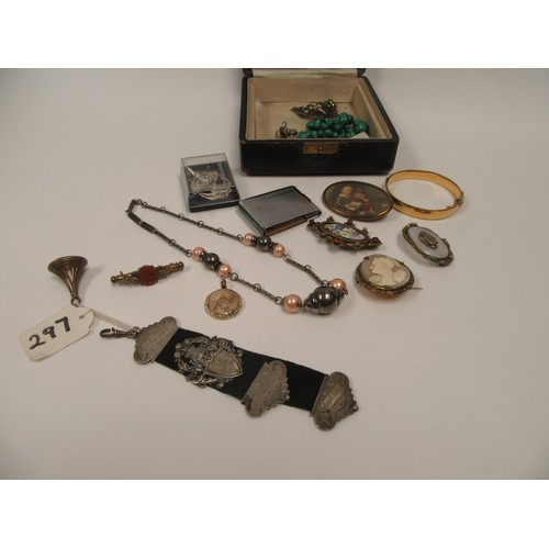 6416 - A box of bijouterie including a 9ct gold metal core stiff hinge bangle, a pinch beck framed shell ca... 