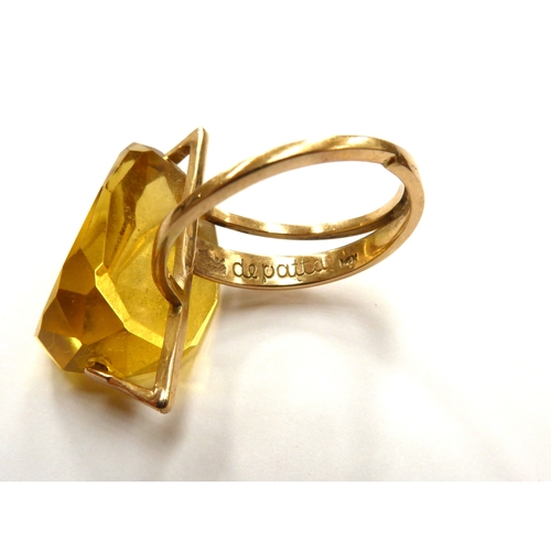 6336 - MARGARET DE PATTA: (1903-1964) An abstract 14k gold ring set with a large three sided facet cut citr... 