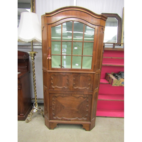 2127 - An 18th Century style walnut corner cabinet, astragal glazed top over a fall front with writing surf... 