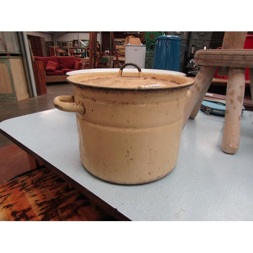 2032 - A yellow enamel pot and lid