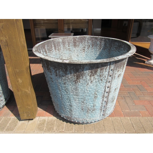 2040 - A substantial metal planter or log bin with verdegris copper effect finish, 97cm diameter x 76cm tal... 