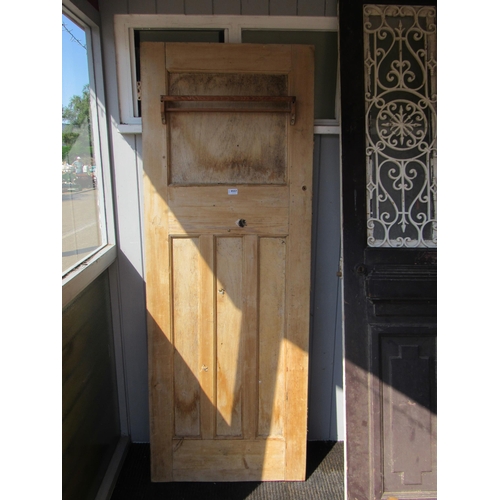 2092 - A reclaimed pine door with rail fitted to back, 27.5