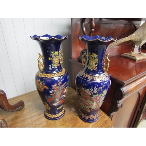 2117 - Two Oriental blue Peacock vases 41cm tall