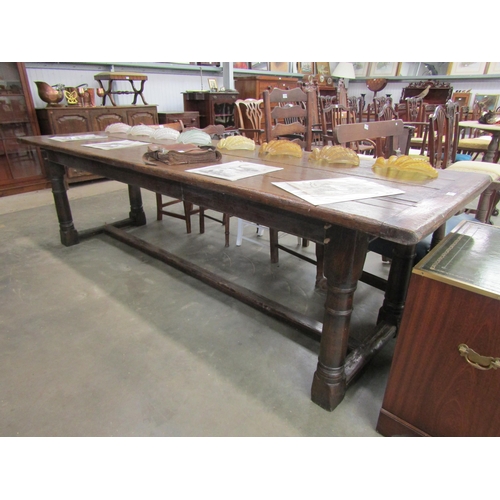 2166 - A large oak refectory table 265 x 83cm