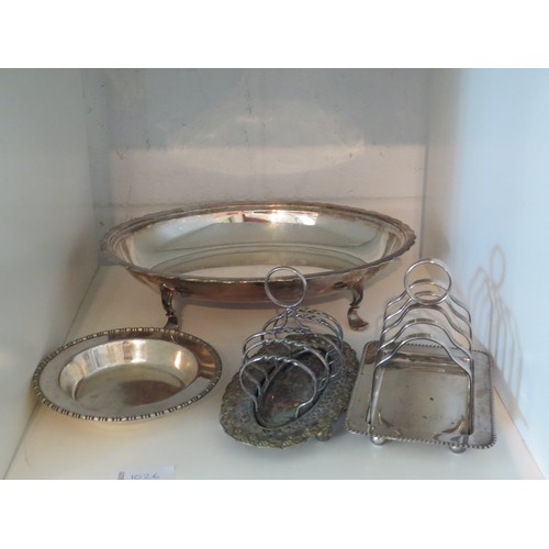 1026 - A box of miscellaneous plated ware to include; a pair of EPNS spill vases, base of entree dish, two ... 