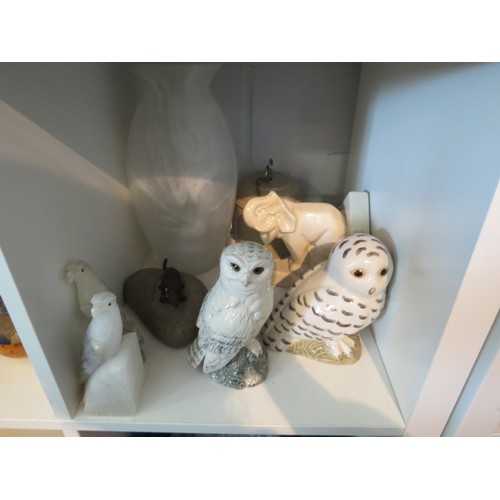 1011 - A box of miscellaneous to include a single crackle-glazed elephant book-end, ceramic owl money box, ... 