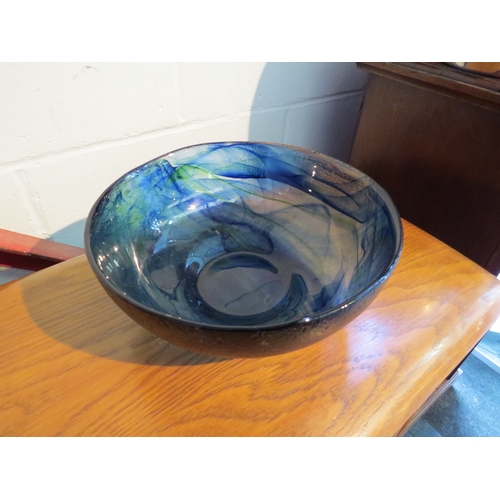 1110 - A blue and green Art Glass bowl, 25cm diameter