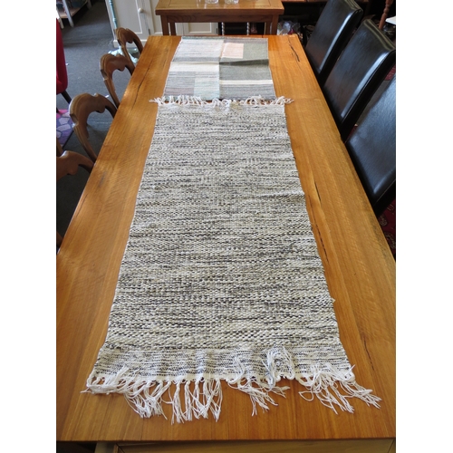 1257 - Two cotton rugs, 128cm x 60cm and 90cm x 56cm