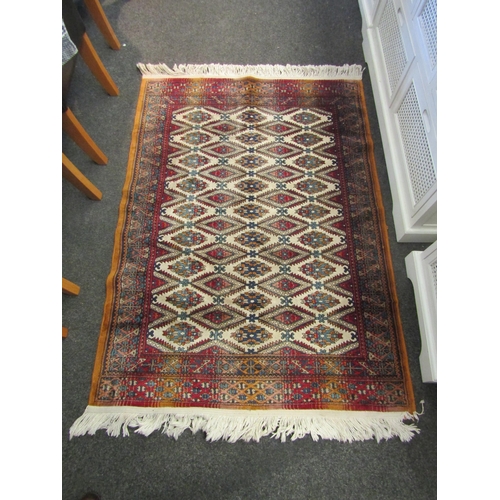 1246 - A Royal Isfahan Collection Turkoman design fringed rug, 132cm x 95cm