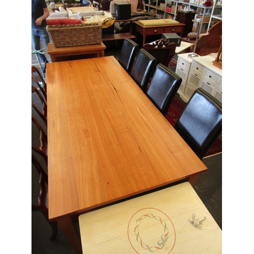 1256 - A large hardwood refectory table, 77cm tall x 240cm long x 105cm wide