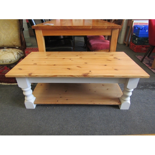 1263 - A painted pine coffee table with under-tier, 121cm long, 62cm deep, 46cm high