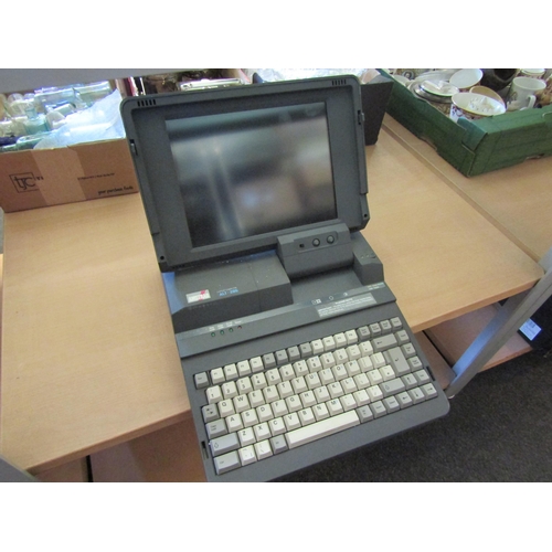 1579 - Two boxes containing assorted electrical items to include vintage Amstrad ALT-286 laptop computer, m... 