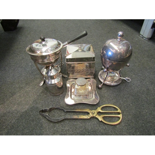 1637 - A box of miscellaneous plated ware to include egg coddler, Harrods, London brandy warmer, biscuit bo... 