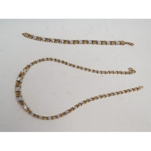 1057 - A two tone 9ct gold necklace with x-shaped links. With a matching bracelet, 17.5g